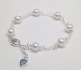 CLASSIC 7-STONE 6-7mm AAA White Freshwater Pearl Interlocking Heart Bracelet